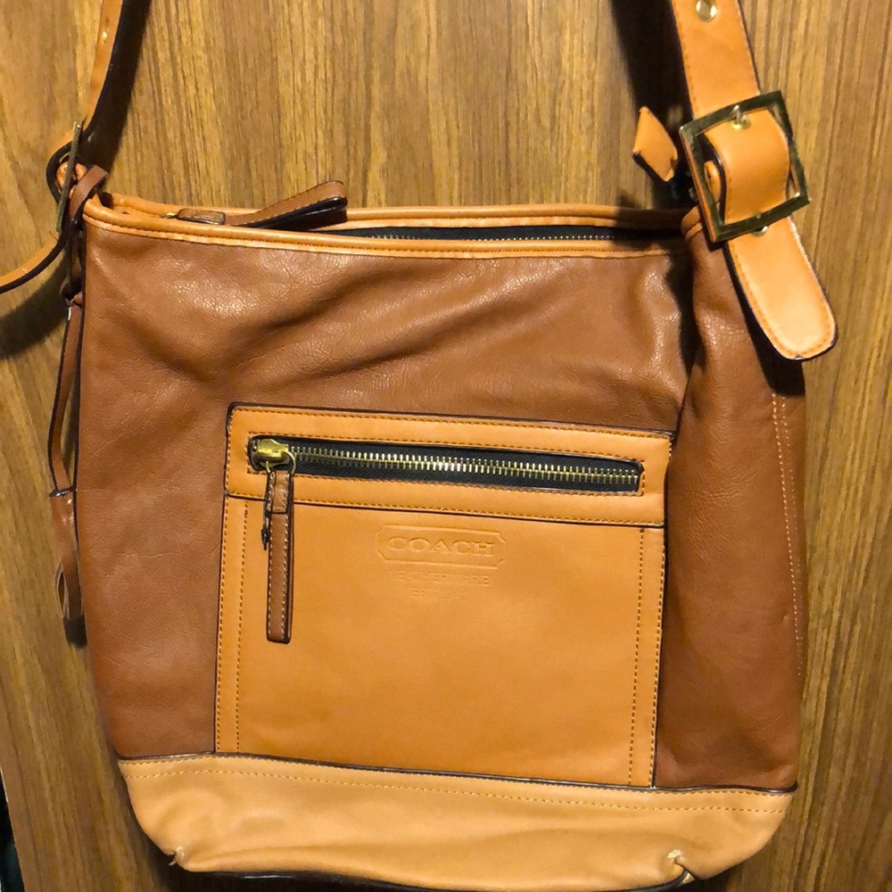 Coach Bucket Bag with buckles and tassels